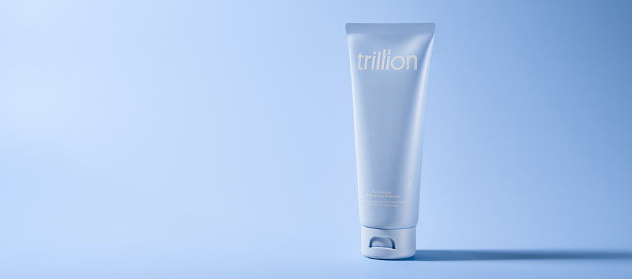 Trillion Fermented Brightening Cleanser photographed on blue